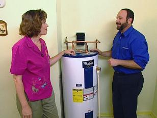 lakewood plumbing technician installs water heater